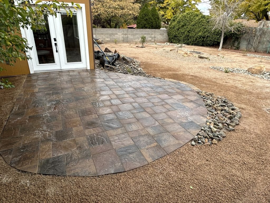 Albuquerque low-maintenance backyard with gravel and turf